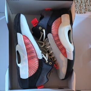 Jordan Black and Orange Athletic Shoes